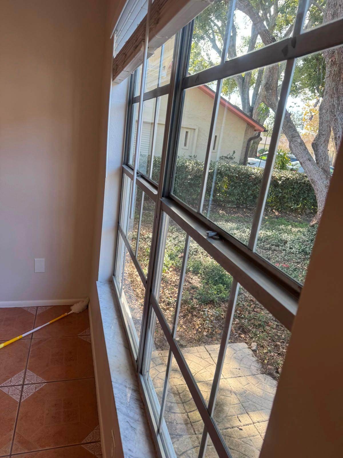 Interior window glass and sills cleaned streak-free